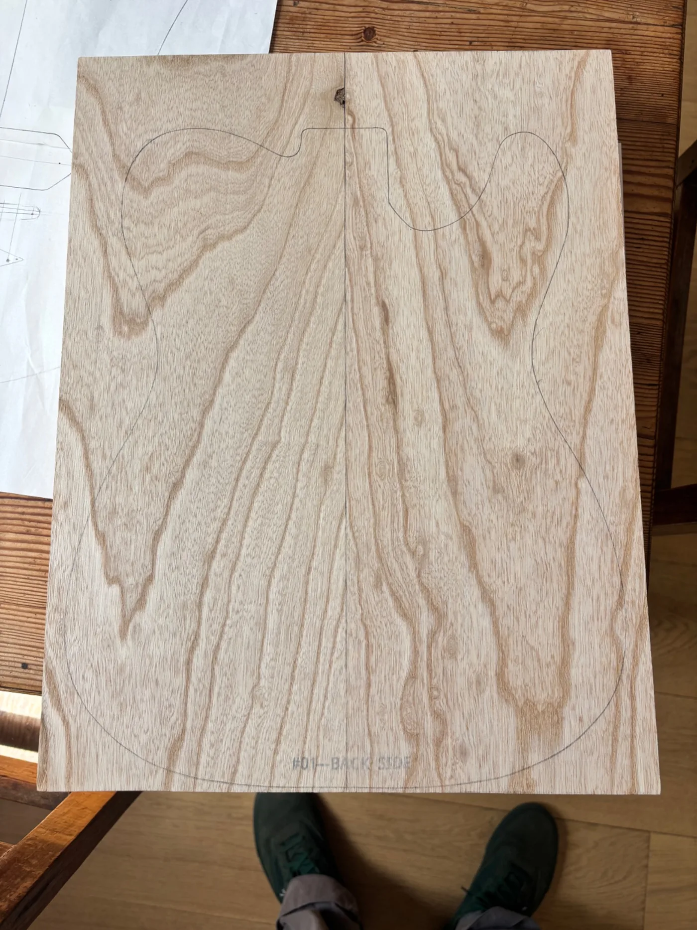 Creamy body blank with outline drawn on ash.